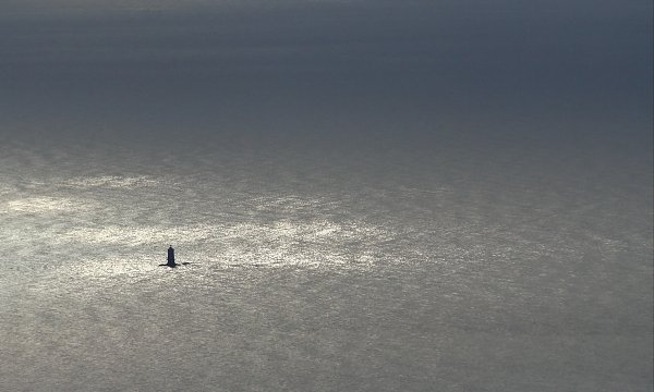 Leuchtturm im Meer Wandbild